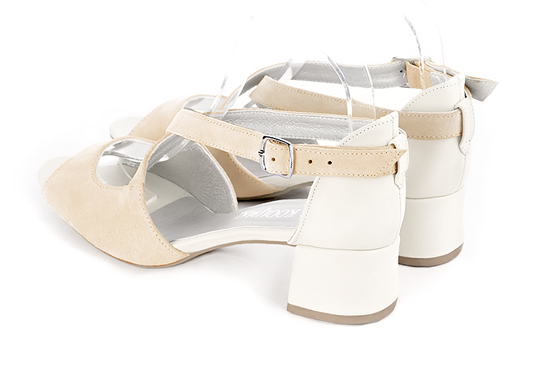 Champagne beige and off white women's closed back sandals, with crossed straps. Round toe. Low flare heels. Rear view - Florence KOOIJMAN